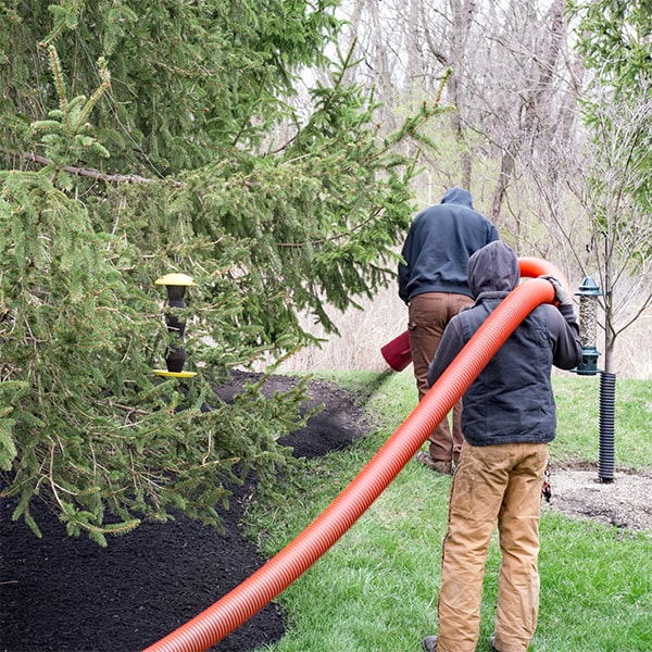 our experienced technicians are skilled at achieving an even and uniform spread of mulch during the blowing process